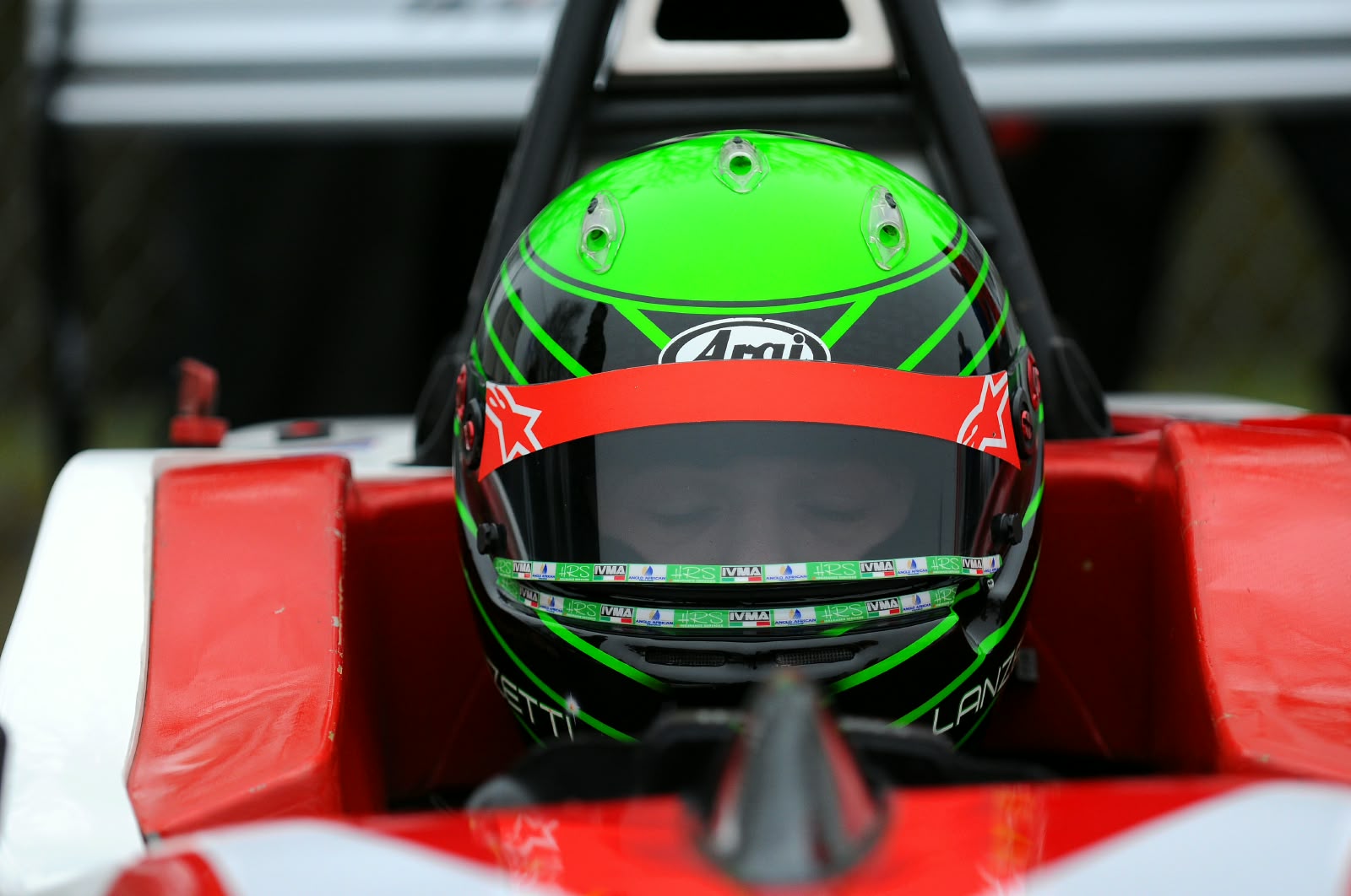 Sebastian Lanzetti in his green and black helmet on the grid